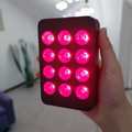 Hand holding a Piri Portable in an indoor setting